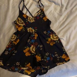 Navy romper with floral print